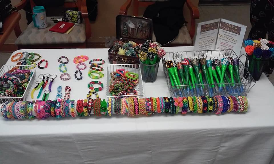 Display of bracelets and pens